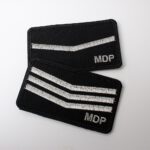 Dystynkcje MDP na mundur bojowy